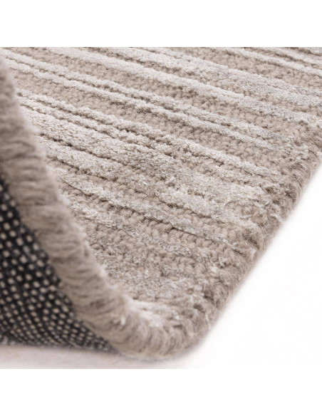 Elevate your space with the Henley Silver minimalist rug—neutral tones, soft texture, and handmade quality for timeless modern