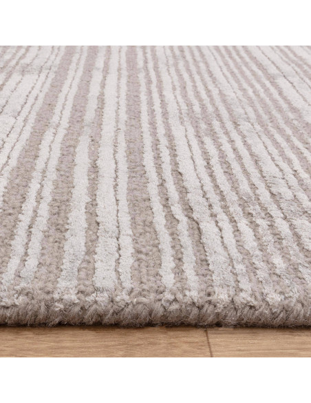 Elevate your space with the Henley Silver minimalist rug—neutral tones, soft texture, and handmade quality for timeless modern