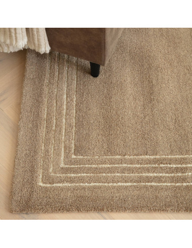 Tappeto Orlo Cocoa in lana naturale, tinta unita, perfetto per ambienti moderni. Eleganza minimal e comfort superiore garantiti
