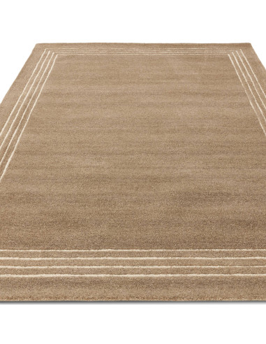 Tappeto Orlo Cocoa in lana naturale, tinta unita, perfetto per ambienti moderni. Eleganza minimal e comfort superiore garantiti