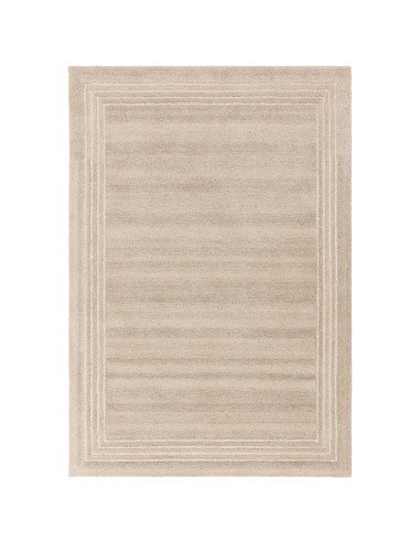 Elevate your space with the Orlo Sand rug, a durable, hand-tufted minimalist rug in a versatile neutral tone for timeless style