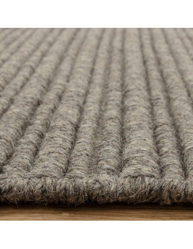 Discover the Ravine Greige minimalist rug—handcrafted natural fibres with soft texture and timeless neutral tones for any moder