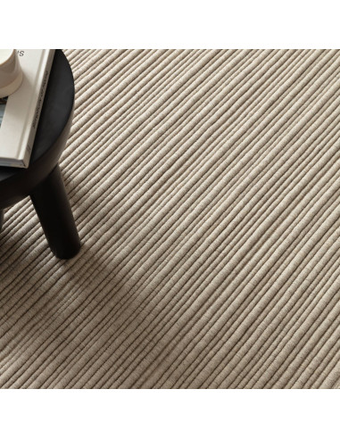 Tappeto Ravine Ivory: eleganza tinta unita, qualità artigianale e comfort per ambienti minimal e raffinati. Disponibile in vari