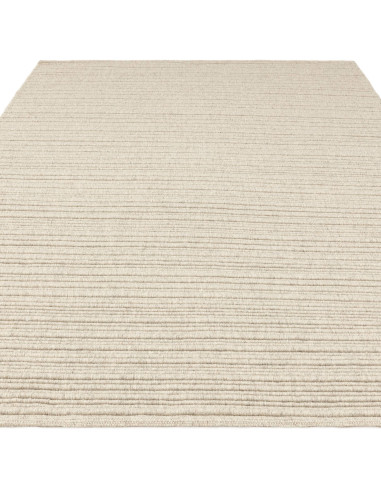 Tappeto Ravine Ivory: eleganza tinta unita, qualità artigianale e comfort per ambienti minimal e raffinati. Disponibile in vari