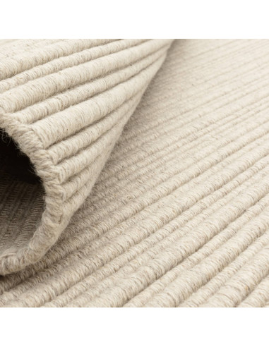 Tappeto Ravine Ivory: eleganza tinta unita, qualità artigianale e comfort per ambienti minimal e raffinati. Disponibile in vari