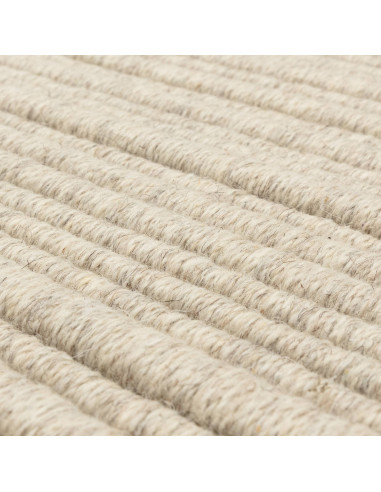 Tappeto Ravine Ivory: eleganza tinta unita, qualità artigianale e comfort per ambienti minimal e raffinati. Disponibile in vari