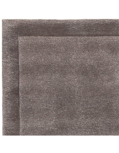 Elevate your space with the Rise Charcoal rug, a soft, hand-tufted minimalist rug in elegant neutral tones for lasting comfort