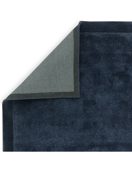 Elevate your space with the Rise Navy minimalist rug, featuring a plush wool-viscose blend and timeless design for lasting comf