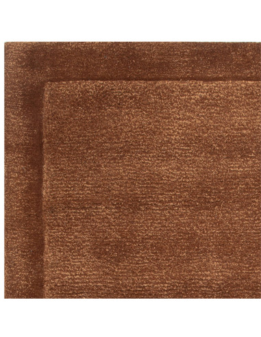 Tappeto tinta unita Rise Rust in lana e viscosa, artigianale e minimal, per un ambiente caldo, elegante e resistente nel tempo.