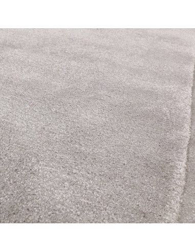 Elevate your space with the Rise Silver rug, a luxurious, handmade minimalist rug in soft silver-gray—perfect for modern, neutr
