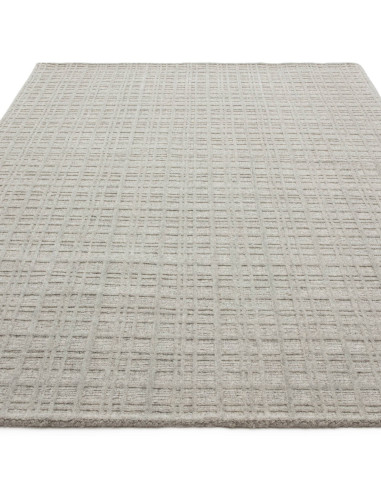 Elevate your space with the Thatch Greige rug, a handcrafted minimalist rug featuring a soft neutral tone and elegant geometric