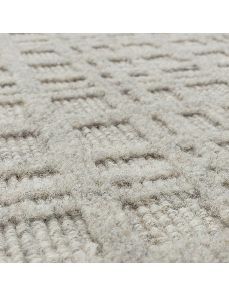 Elevate your space with the Thatch Greige rug, a handcrafted minimalist rug featuring a soft neutral tone and elegant geometric
