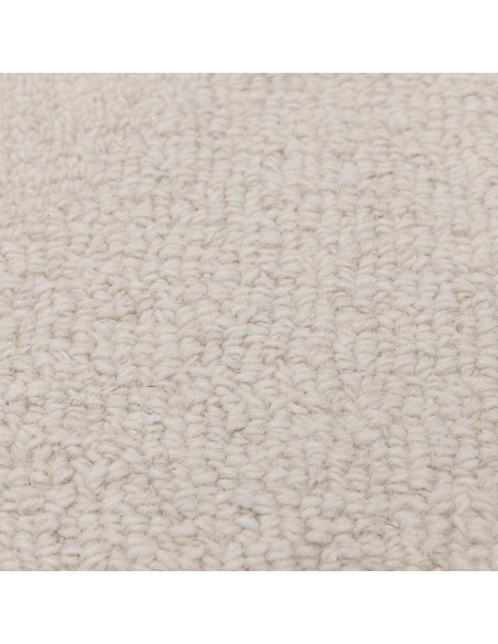 Elevate your space with the Theodore Chevron Ivory rug, a plush and durable minimalist rug featuring a subtle chevron pattern i