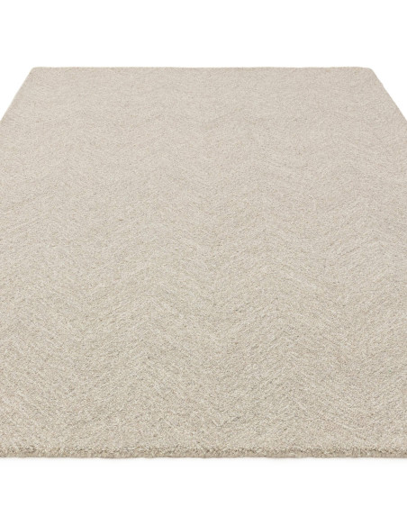 Handcrafted minimalist rug in neutral tones, offering plush comfort and durable natural fibers—perfect for elevating any modern