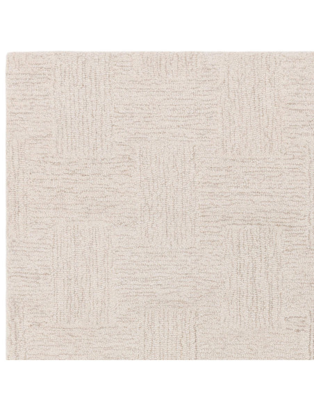 Elevate your space with the Theodore Hatch White & Sand rug, a minimalist rug featuring hand-tufted texture and timeless neutra