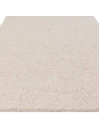 Elevate your space with the Theodore Hatch White & Sand rug, a minimalist rug featuring hand-tufted texture and timeless neutra