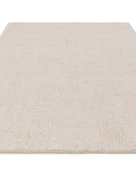 Elevate your space with the Theodore Hatch White & Sand rug, a minimalist rug featuring hand-tufted texture and timeless neutra