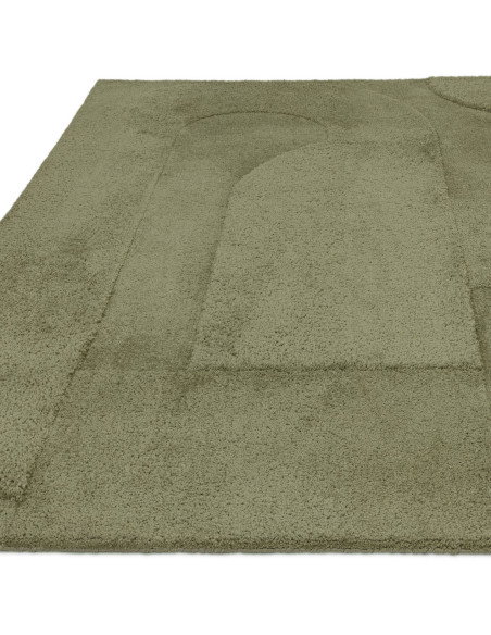 Soft and durable Tova Green minimalist rug with subtle patterns, perfect for adding modern elegance and calm to any living spac