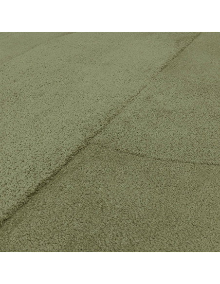 Soft and durable Tova Green minimalist rug with subtle patterns, perfect for adding modern elegance and calm to any living spac