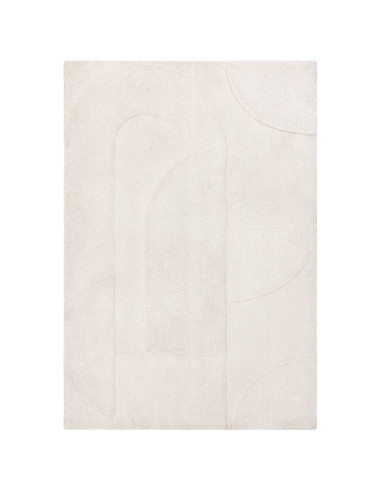 Elevate your space with the Tova Ivory rug, a durable and stylish minimalist rug featuring a soft neutral tone and subtle geome