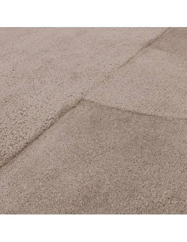 Discover the Tova Moleskin rug, a soft, durable minimalist rug in neutral tones that adds elegant texture and easy maintenance