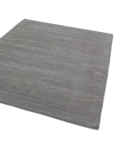 Elevate your space with the York Grey rug, a minimalist rug featuring a geometric border and soft, durable 100% wool for timele