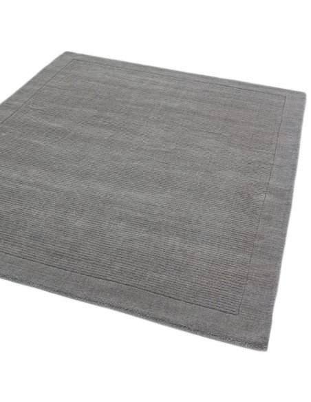 Elevate your space with the York Grey rug, a minimalist rug featuring a geometric border and soft, durable 100% wool for timele