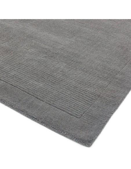 Elevate your space with the York Grey rug, a minimalist rug featuring a geometric border and soft, durable 100% wool for timele