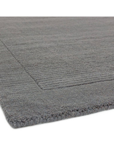 Elevate your space with the York Grey rug, a minimalist rug featuring a geometric border and soft, durable 100% wool for timele