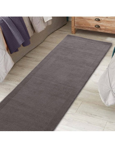 Elevate your space with the York Grey rug, a minimalist rug featuring a geometric border and soft, durable 100% wool for timele