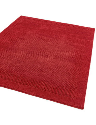 Elevate your space with the York Poppy rug—vibrant red, minimalist design, and soft natural wool for lasting comfort and style.