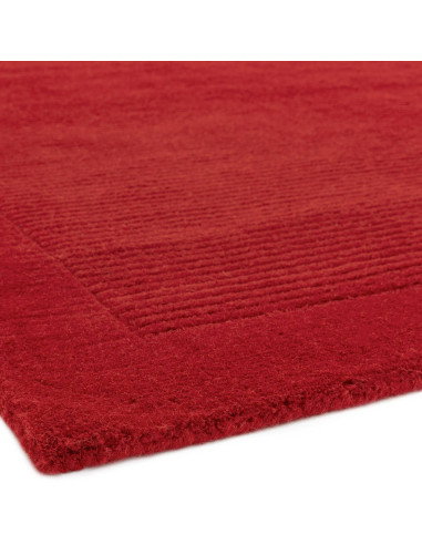 Elevate your space with the York Poppy rug—vibrant red, minimalist design, and soft natural wool for lasting comfort and style.