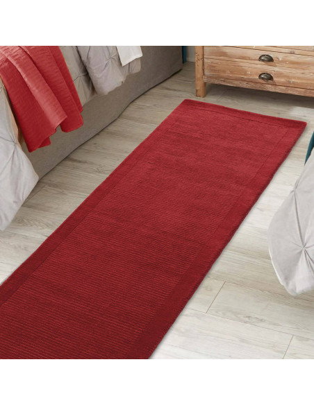 Elevate your space with the York Poppy rug—vibrant red, minimalist design, and soft natural wool for lasting comfort and style.