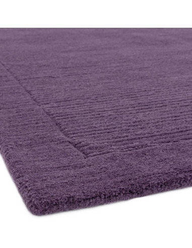 Tappeto York Purple: eleganza minimalista e tinta unita in lana naturale, perfetto per ambienti moderni e raffinati. Comfort e