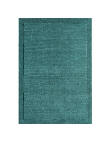 Elevate your space with the York Teal rug—an elegant minimalist rug featuring a calming teal shade and soft, durable 100% wool