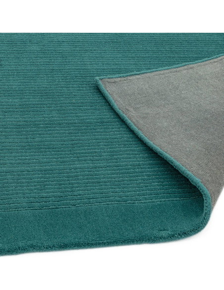 Elevate your space with the York Teal rug—an elegant minimalist rug featuring a calming teal shade and soft, durable 100% wool