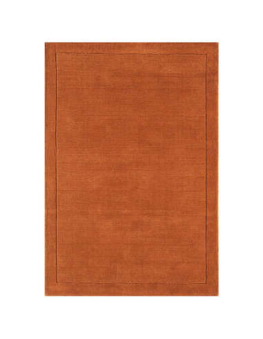 Elevate your space with the York Terracotta rug, a minimalist rug crafted from natural wool featuring an elegant geometric desi