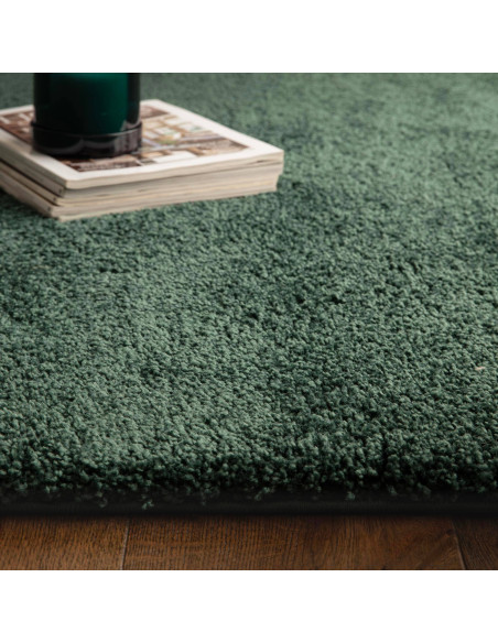 Add luxurious comfort and style with the Atlas Emerald shaggy rug, featuring a rich green hue and durable, easy-care polypropyl