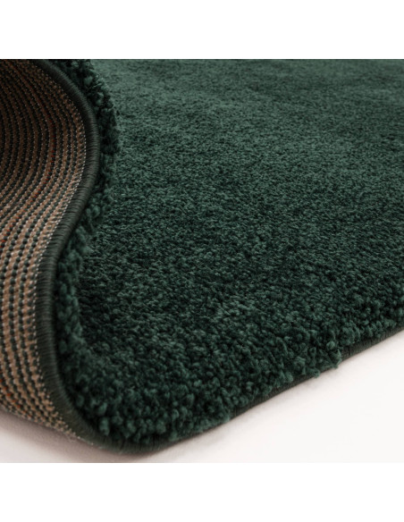 Add luxurious comfort and style with the Atlas Emerald shaggy rug, featuring a rich green hue and durable, easy-care polypropyl