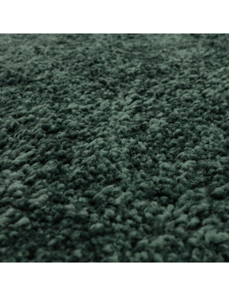 Add luxurious comfort and style with the Atlas Emerald shaggy rug, featuring a rich green hue and durable, easy-care polypropyl