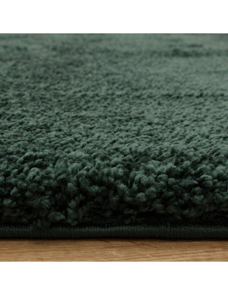 Add luxurious comfort and style with the Atlas Emerald shaggy rug, featuring a rich green hue and durable, easy-care polypropyl