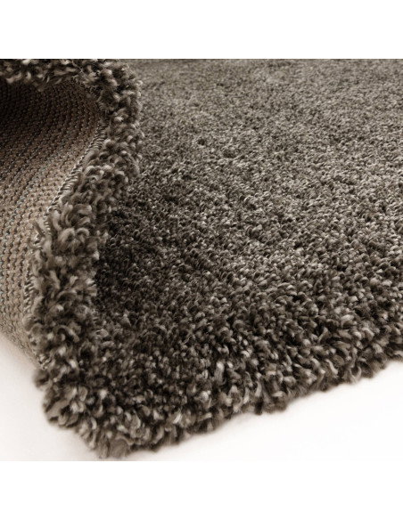 Experience plush comfort and modern elegance with the Atlas Gunmetal shaggy rug—durable, stylish, and perfect for any contempor