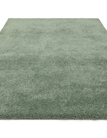 Add cozy comfort and style with the Atlas Sage shaggy rug, featuring soft texture, durable polypropylene fibers, and a calming