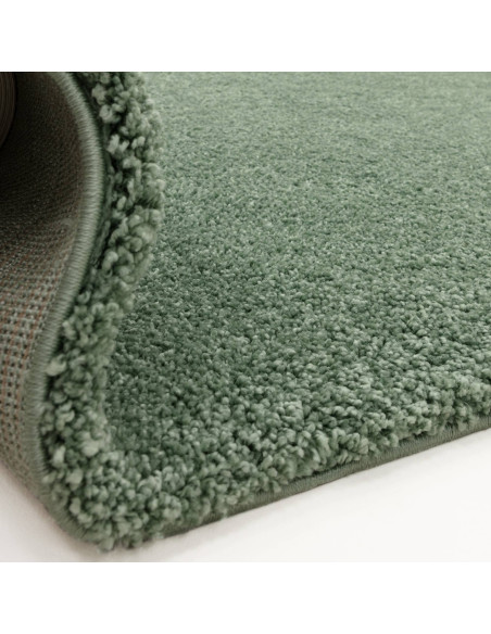 Add cozy comfort and style with the Atlas Sage shaggy rug, featuring soft texture, durable polypropylene fibers, and a calming