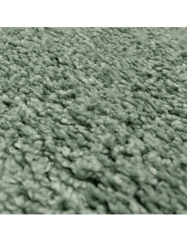 Add cozy comfort and style with the Atlas Sage shaggy rug, featuring soft texture, durable polypropylene fibers, and a calming