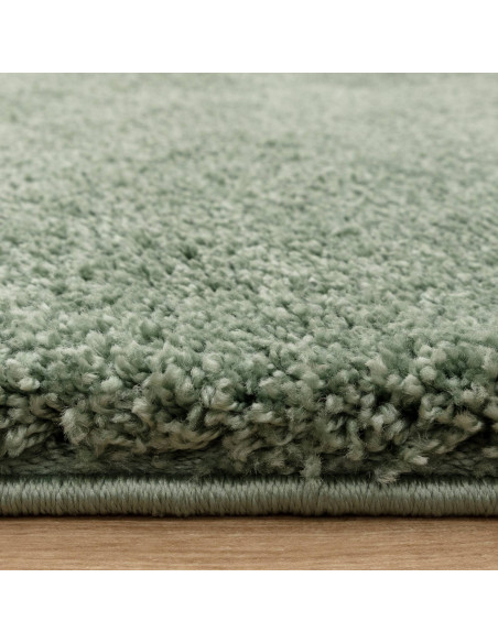 Add cozy comfort and style with the Atlas Sage shaggy rug, featuring soft texture, durable polypropylene fibers, and a calming