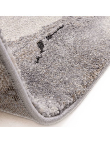 Elevate your space with the Mirage Oasis Grey shaggy rug, featuring a soft, durable design and stunning abstract patterns for m