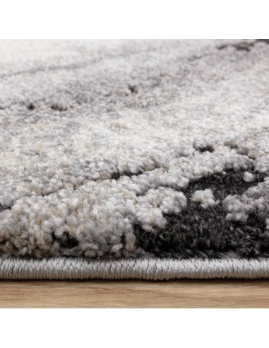 Elevate your space with the Mirage Oasis Grey shaggy rug, featuring a soft, durable design and stunning abstract patterns for m