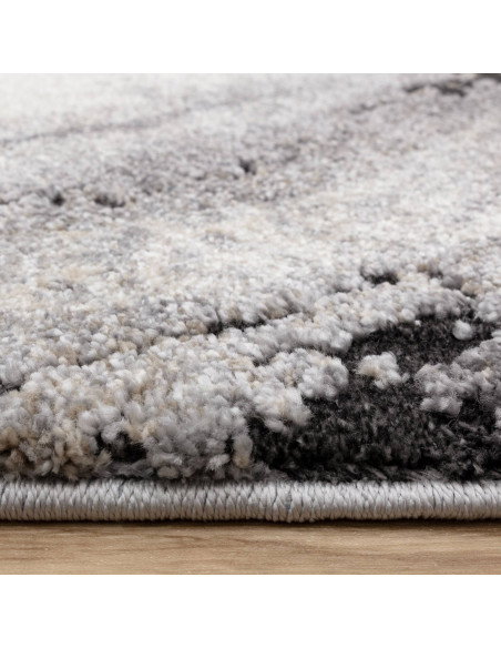 Tappeto Mirage Oasis Grey, design astratto e spessore 2.5 cm, perfetto tra i tappeti shaggy per comfort e stile contemporaneo.