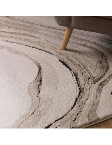 Elevate your space with the Mirage Quartz Beige shaggy rug, featuring a plush texture and abstract design for lasting comfort a